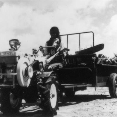 Lady Farmer Driving Tractor